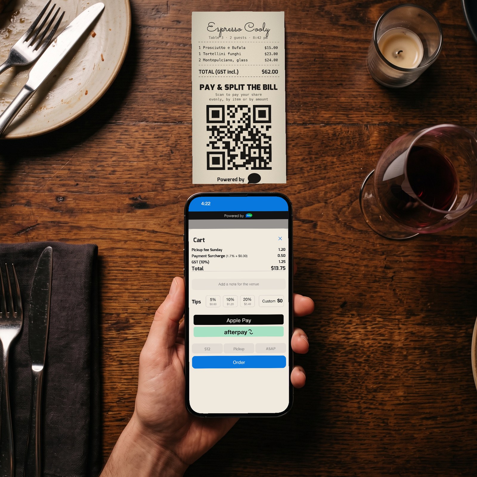 Seen from above: a printed bill on the table with a "Pay & split the bill" QR code, and a guest’s phone showing the Asky payment screen — Due $56.60, Split, Tips, Apple Pay